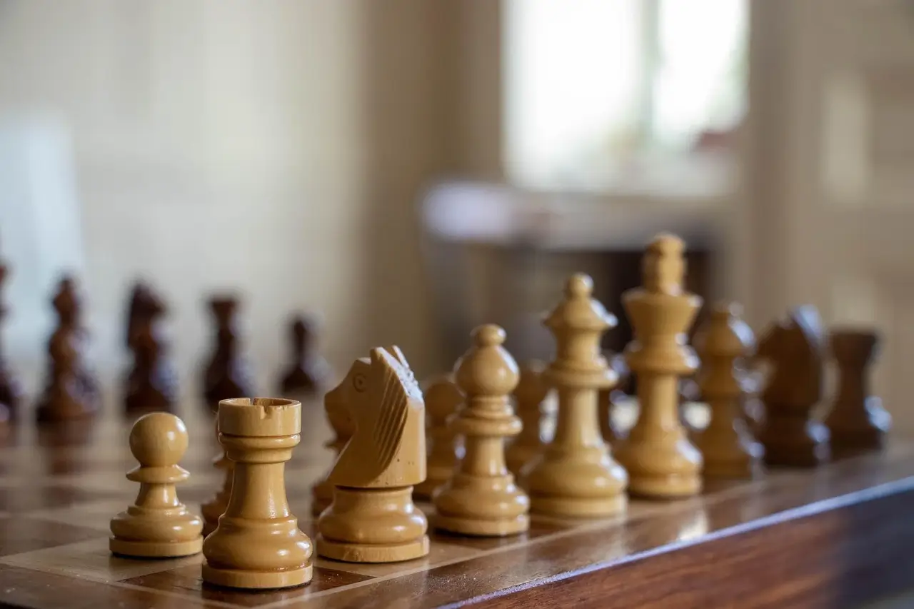 Chess board with pieces arranged in the starting position