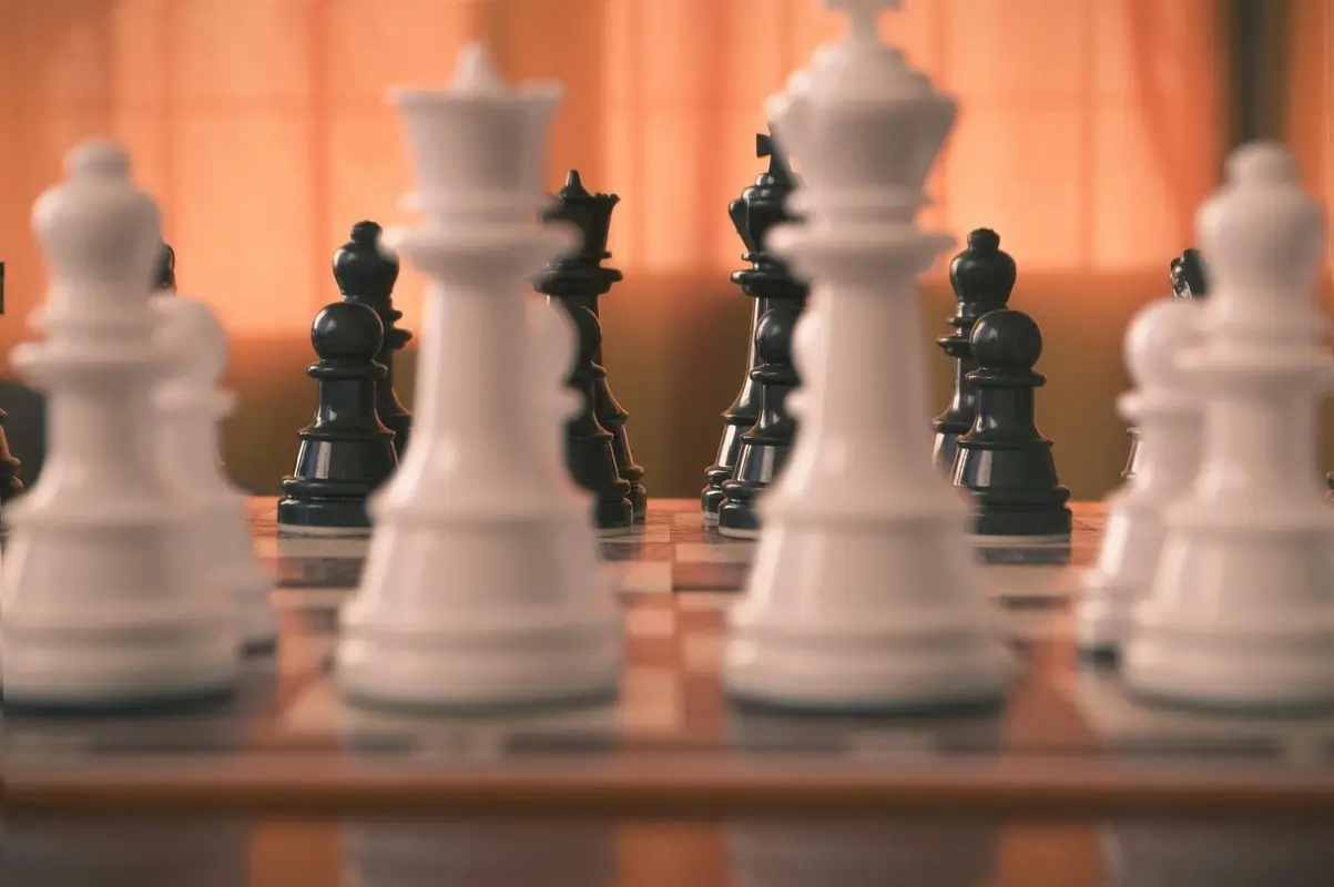 Chess board and pieces illustrating chess openings for beginners